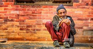old-beggar-in-the-street-