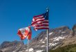 The US flag and Canadian flag.