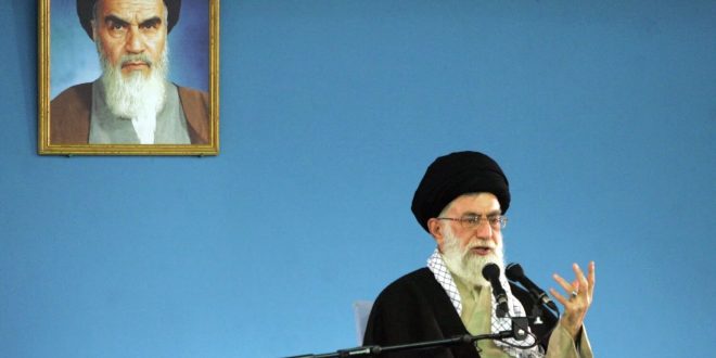 iran-tehran-khamenei-portrait-khomeini-
